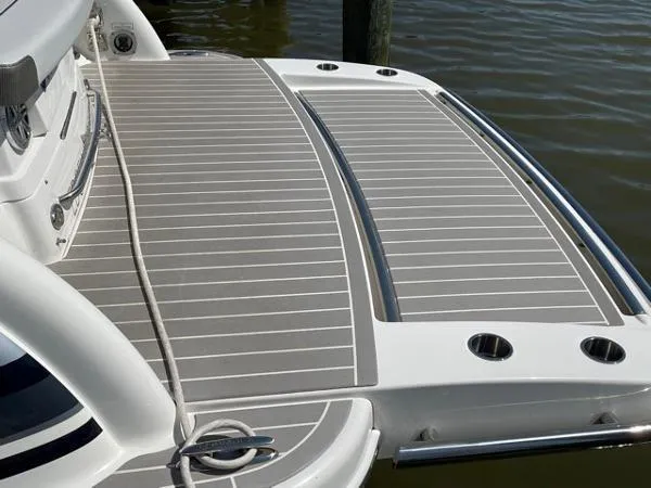 Slide: The Image of 2019 Formula Boats 350 CBR swim platform with sleek design and stainless steel accents. - 19