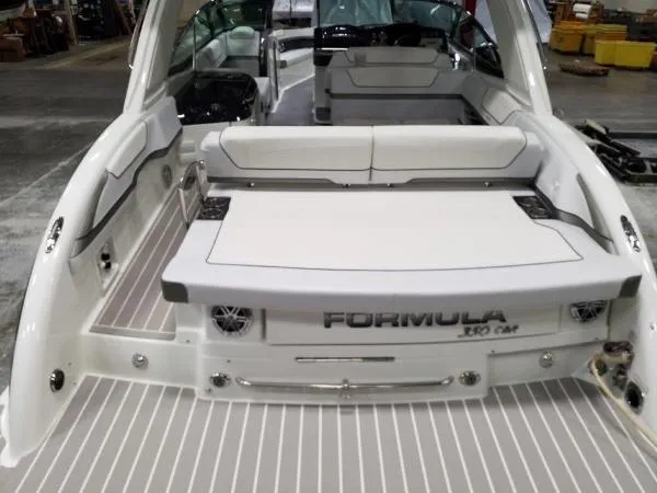 Slide: The Image of 2019 Formula Boats 350 CBR, luxury boat interior with seating and sleek design. - 20