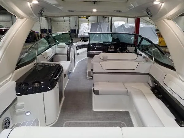 Slide: The Image of 2019 Formula Boats 350 CBR interior with luxurious seating and modern dashboard. - 21