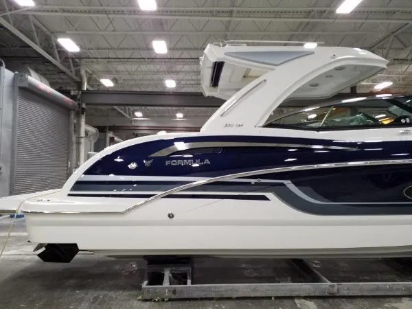 Slide: The Image of 2019 Formula Boats 350 CBR in a showroom, showcasing sleek design and modern features. - 7
