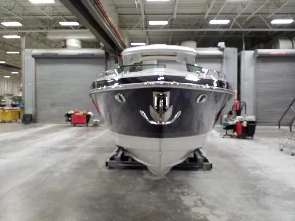 Slide: The Image of 2019 Formula Boats 350 CBR in a warehouse, front view. - 9