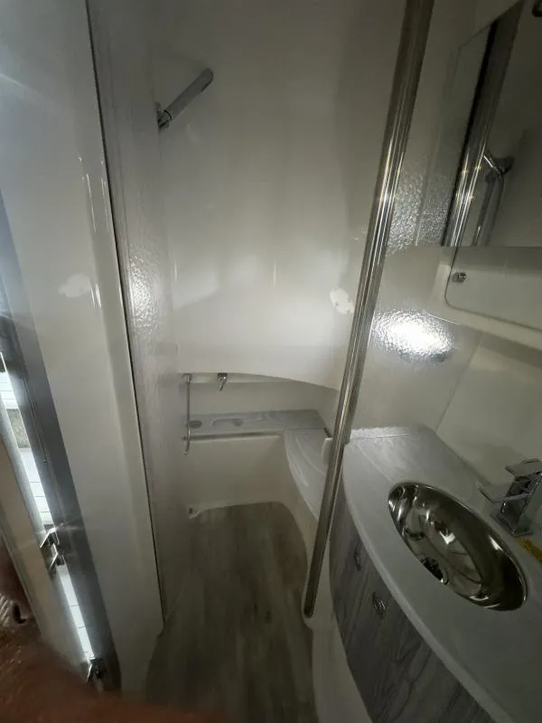 Slide: The Image of 2023 Formula Boats 40 PC bathroom with modern fixtures and compact design. - 15