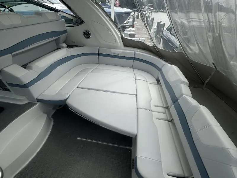 Slide: The Image of 2023 Formula Boats 40 PC interior with luxurious white seating and modern design. - 6
