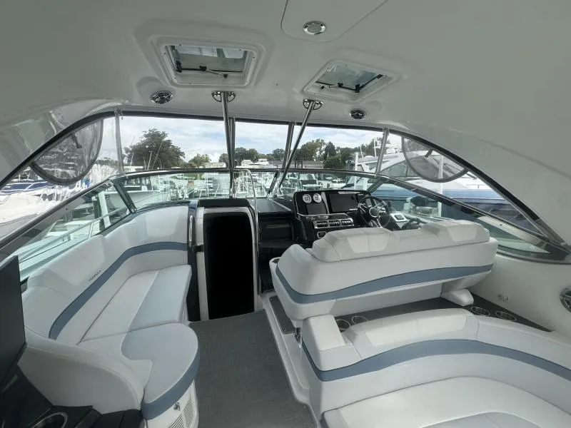 Slide: The Image of 2023 Formula Boats 40 PC interior with modern seating and navigation controls. - 8
