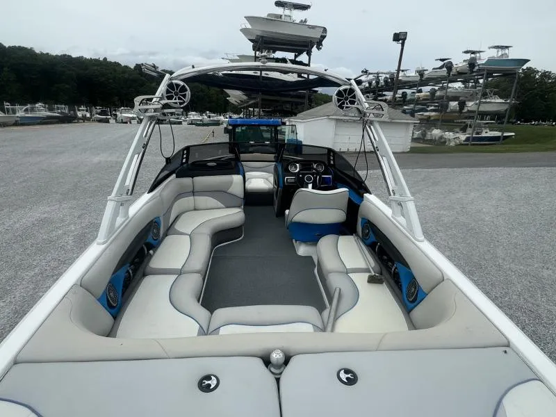 Slide: The Image of 2013 Malibu Wakesetter 23 LSV boat interior with spacious seating and modern design. - 8