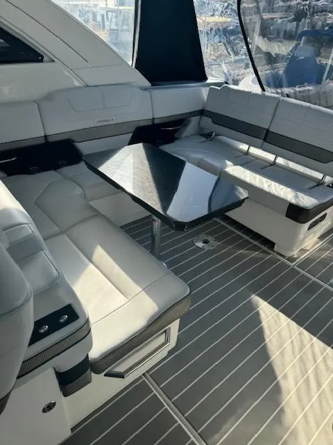 Slide: The Image of Luxurious interior of 2020 Formula Boats 380 SSC with sleek seating and modern table design. - 21