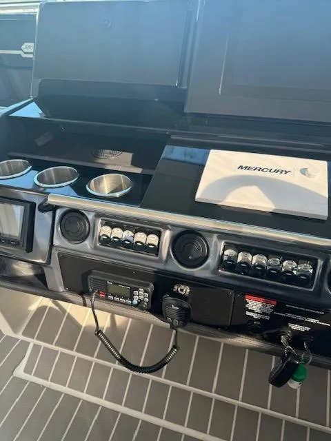 Slide: The Image of Control panel of a 2020 Formula Boats 380 SSC with Mercury equipment. - 24