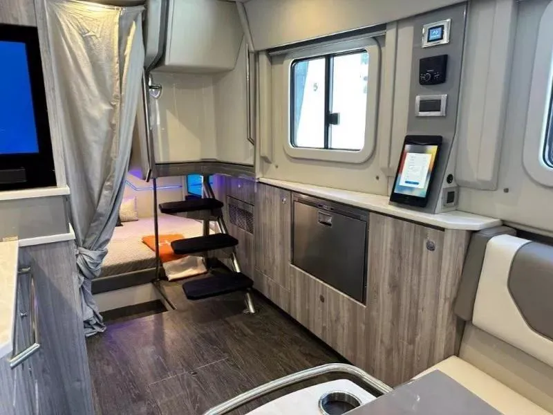 Slide: The Image of Interior of 2022 Formula 430 Super Sport Crossover, featuring modern design and luxury amenities. - 20