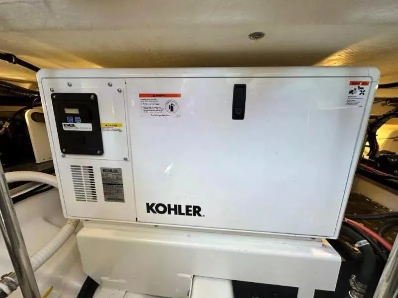 Slide: The Image of Kohler generator in 2022 Formula 430 Super Sport Crossover engine room. - 24