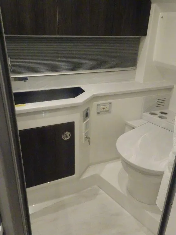 Slide: The Image of Bathroom interior of 2021 Formula 430 Super Sport Crossover yacht. - 18
