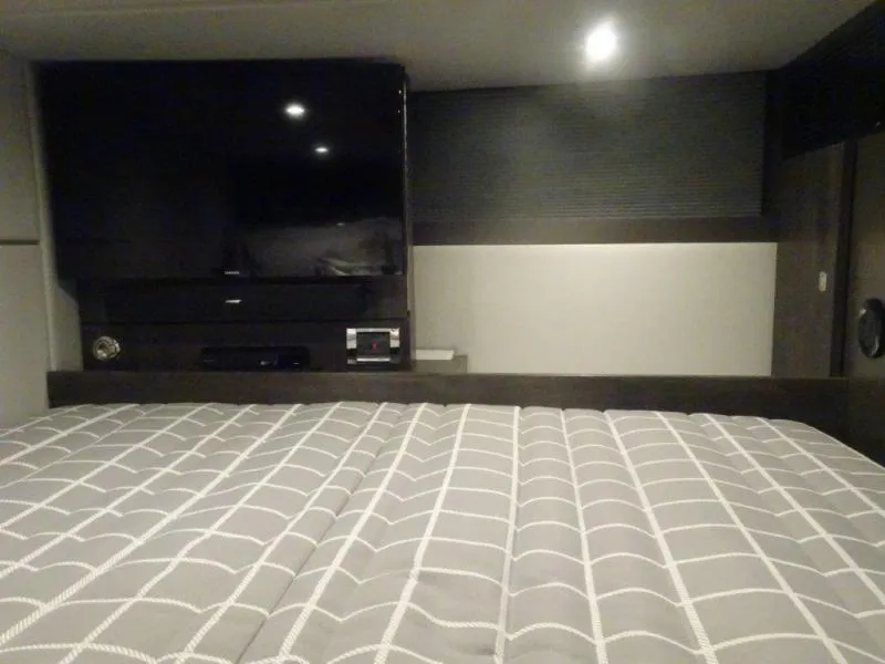 Slide: The Image of Interior of 2021 Formula 430 Super Sport Crossover with bed and TV setup. - 19