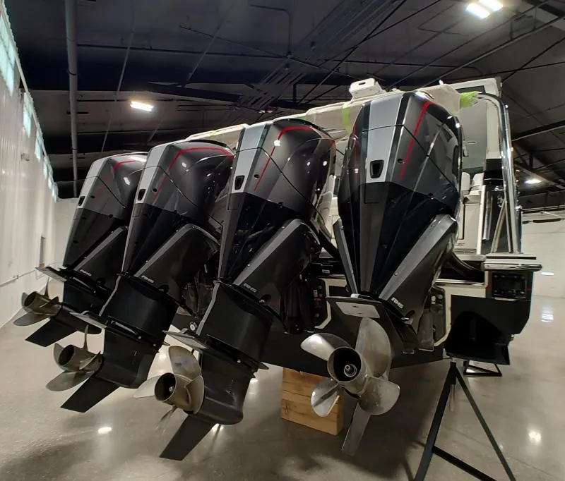 Slide: The Image of 2021 Formula 430 Super Sport Crossover with four powerful outboard engines in a showroom. - 3