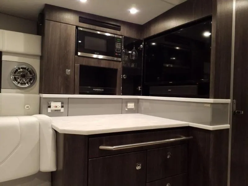 Slide: The Image of Modern interior of 2021 Formula 430 Super Sport Crossover with sleek kitchen amenities. - 4