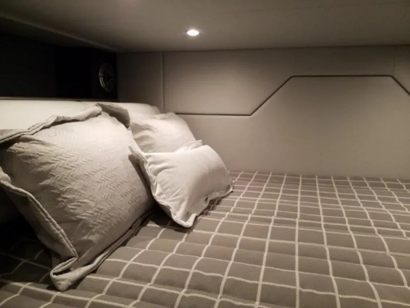 Slide: The Image of Cozy cabin interior of 2021 Formula 430 Super Sport Crossover with plush bedding. - 7