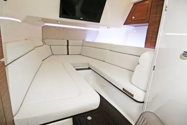 Slide: The Image of Luxurious interior cabin of 2020 Boston Whaler 350 Realm with plush seating and modern design. - 11