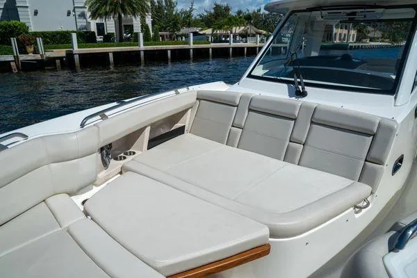 Slide: The Image of 2020 Boston Whaler 350 Realm boat with spacious seating and luxurious interior. - 12