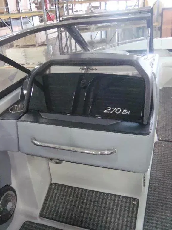 Slide: The Image of 2014 Formula 270 Bowrider interior with windshield and console details. - 7