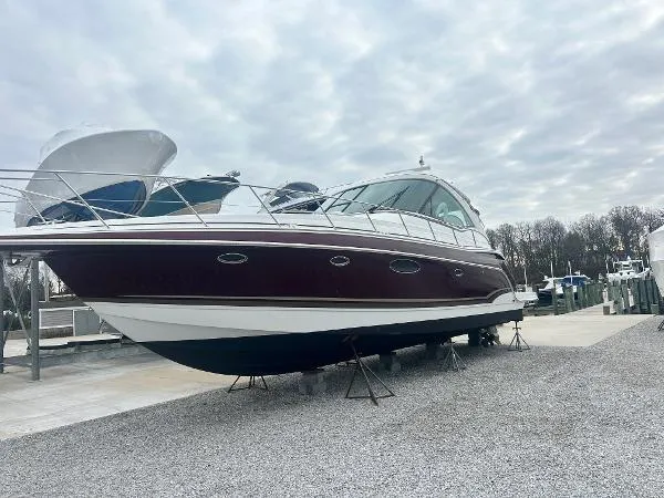 Slide: The Image of 2012 Formula Boats 45 Yacht on dry dock under cloudy sky. - 1