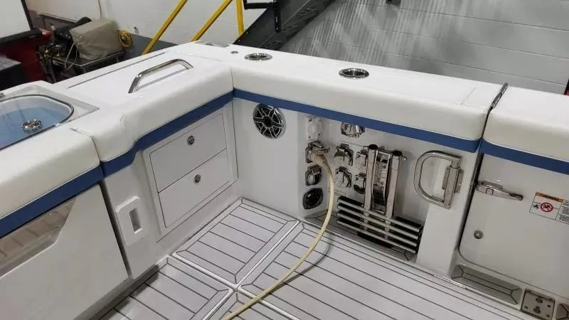 Slide: The Image of 2025 Formula 387 Center Console Fish boat interior with storage and utility features. - 12