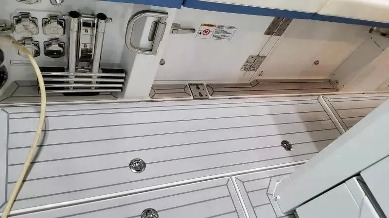 Slide: The Image of 2025 Formula 387 Center Console Fish boat deck with sleek, modern design and fittings. - 23