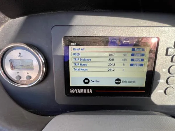 Slide: The Image of Dashboard of 2017 Crownline Eclipse E6 XS showing trip data and Yamaha controls. - 11