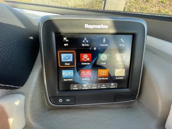 Slide: The Image of Raymarine navigation display on 2017 Crownline Eclipse E6 XS boat dashboard. - 12