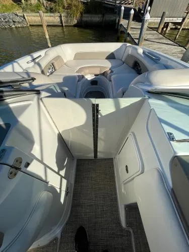 Slide: The Image of 2017 Crownline Eclipse E6 XS boat interior with spacious seating and modern design. - 17