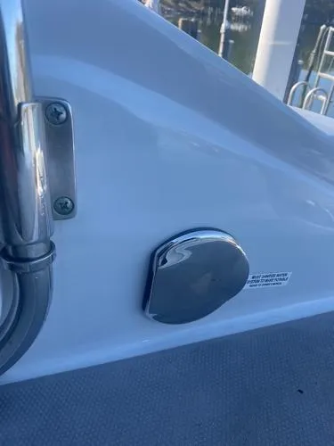 Slide: The Image of 2017 Crownline Eclipse E6 XS boat detail with chrome fixture and railing. - 18