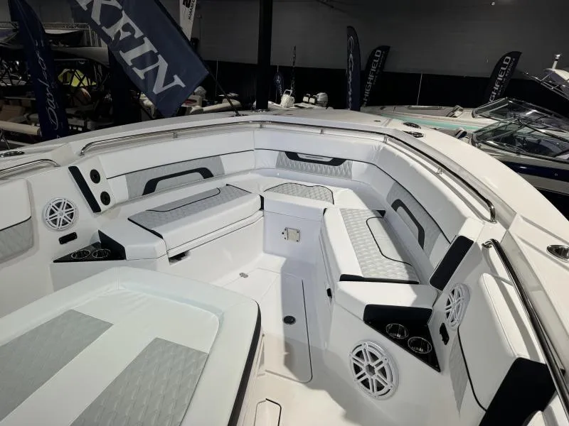 Slide: The Image of 2025 Blackfin 332 boat interior with sleek seating and modern design. - 10