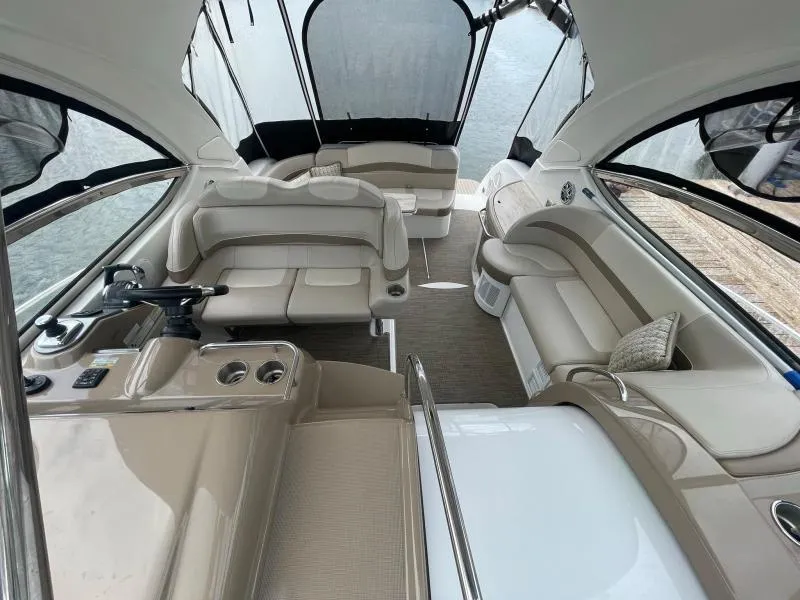 Slide: The Image of 2016 Formula Boats 37 PC interior with beige seating and helm, featuring elegant design. - 15