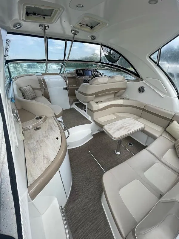 Slide: The Image of Luxurious interior of a 2016 Formula Boats 37 PC, featuring elegant seating and modern design. - 17