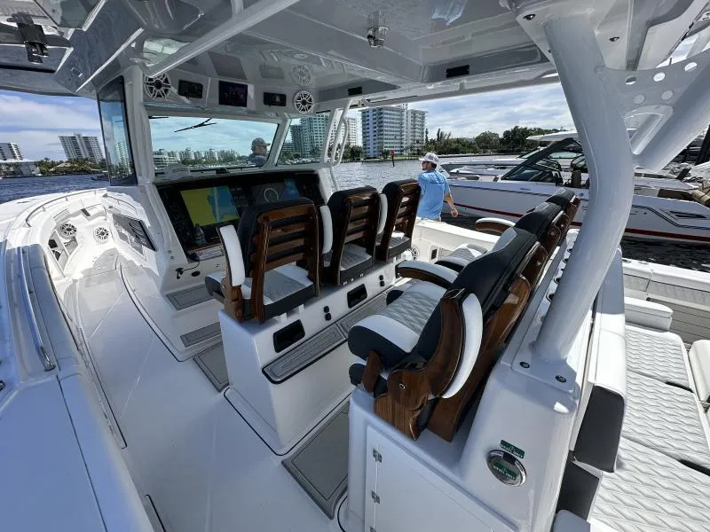 Slide: The Image of Interior of a 2025 Blackfin 400 boat with modern seating and navigation equipment. - 12