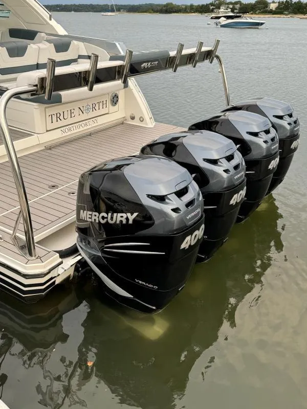 Slide: The Image of 2020 Formula 400 Super Sport Crossover with four Mercury 400 outboard engines on water. - 8