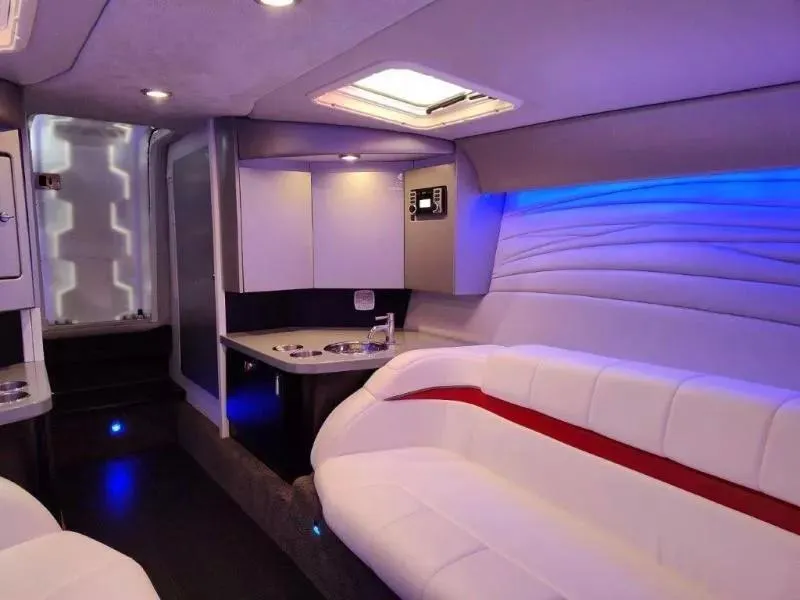 Slide: The Image of Luxurious interior of a 2015 Formula 382 FASTech boat with modern seating and ambient lighting. - 17