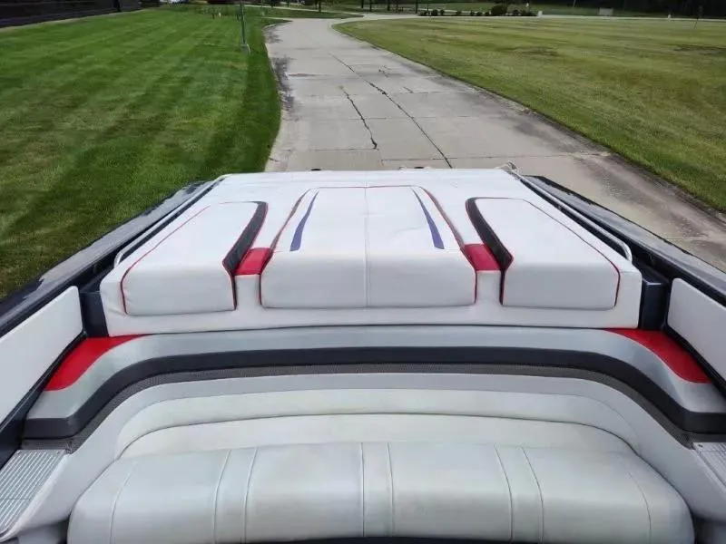 Slide: The Image of 2015 Formula 382 FASTech boat interior with white, red, and blue upholstery. - 8