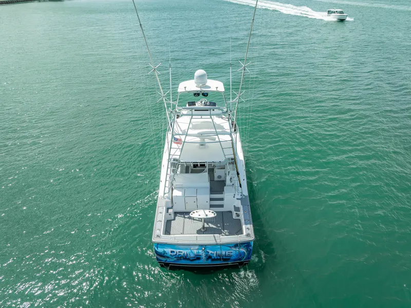 Slide: The Image of 2006 Tiara Yachts 4200 Open cruising on clear turquoise waters. - 22