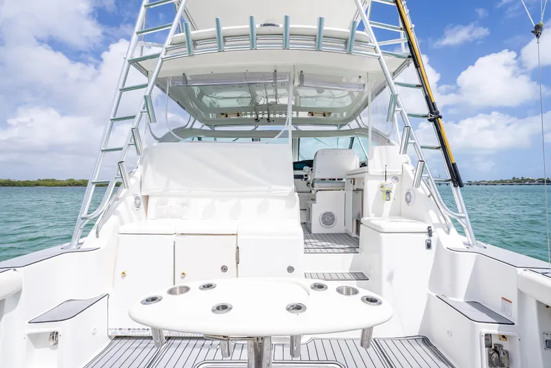 Slide: The Image of 2006 Tiara Yachts 4200 Open boat interior with seating and ocean view. - 49