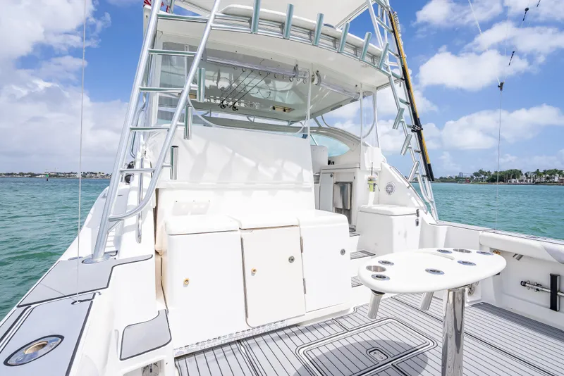 Slide: The Image of 2006 Tiara Yachts 4200 Open, spacious deck, ocean backdrop, clear skies. - 51
