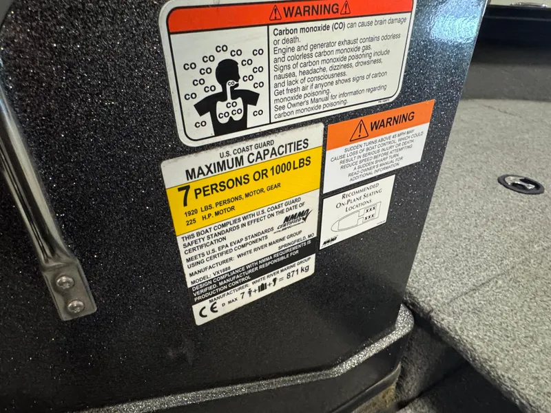 Slide: The Image of 2021 Ranger VX1888 WT boat warning labels, maximum capacity 7 persons or 1000 lbs. - 10