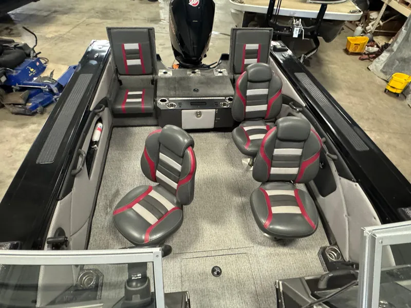 Slide: The Image of 2021 Ranger VX1888 WT boat interior with gray and red seating, spacious layout. - 8