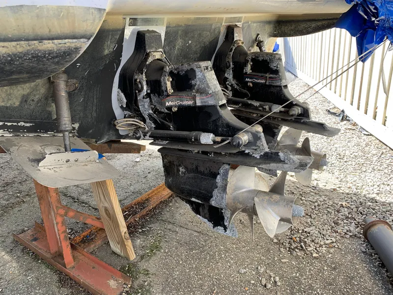 Slide: The Image of 2017 Sea Ray Sundancer 310 boat propellers and stern drive on dry dock. - 13