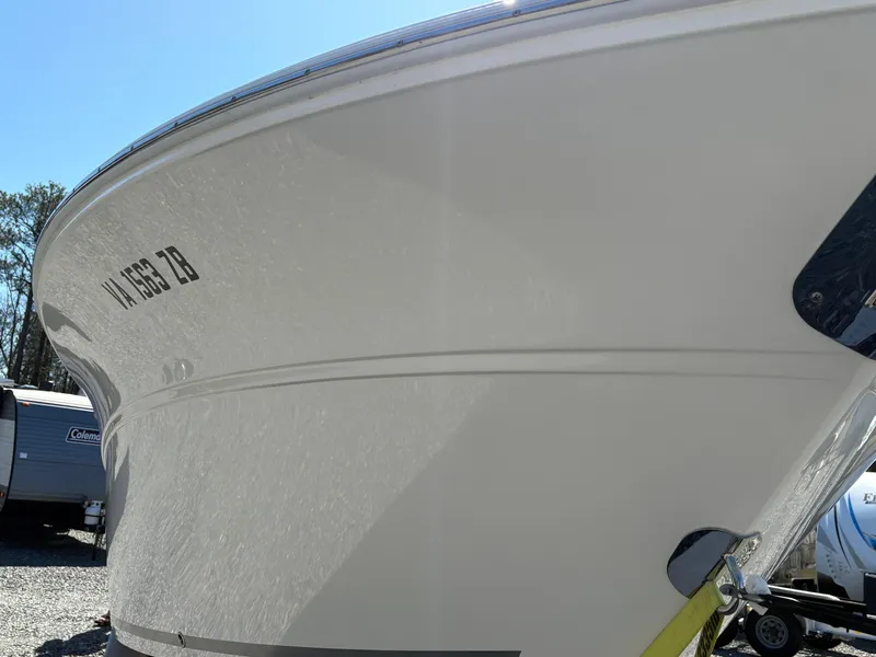 Slide: The Image of 2024 Sea Fox 268 Commander boat hull, close-up view in sunlight. - 7