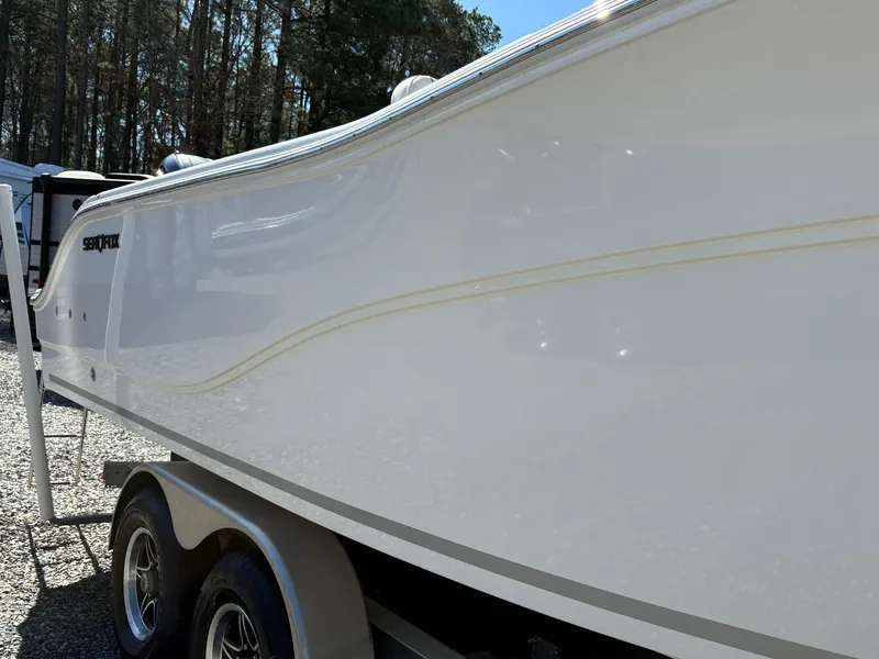 Slide: The Image of 2024 Sea Fox 268 Commander boat on trailer, side view. - 8