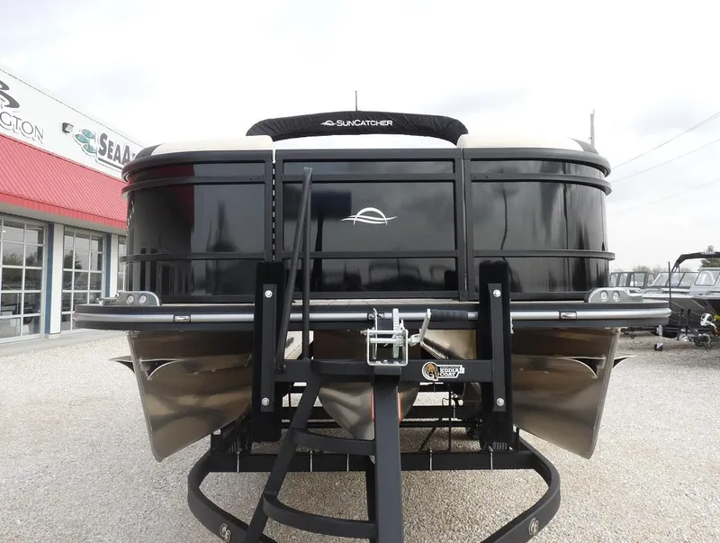 Slide: The Image of 2025 SunCatcher Select 322SS pontoon boat on trailer, front view. - 7