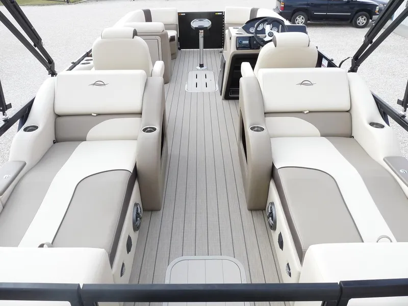 Slide: The Image of 2025 SunCatcher Select 322SS pontoon boat interior with luxurious seating and modern design. - 8