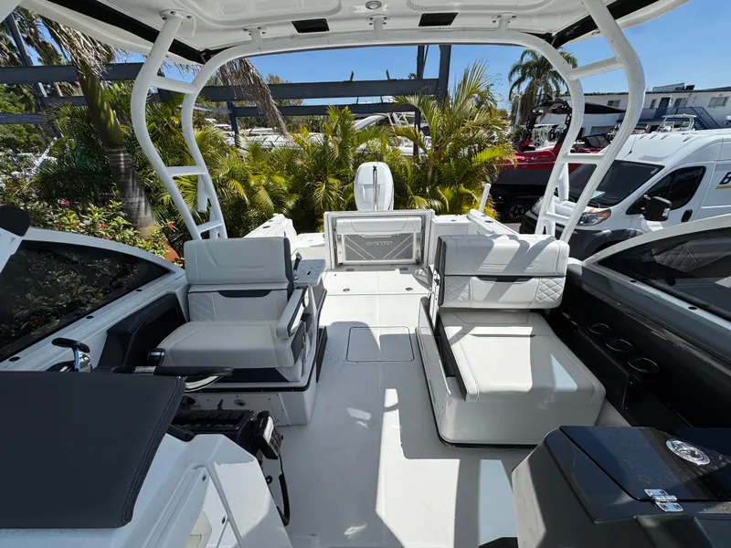 Slide: The Image of 2022 Blackfin 252 DC boat interior with seating and modern design. - 43