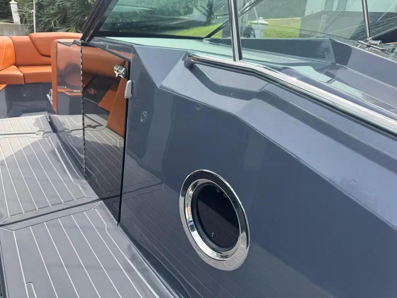 Slide: The Image of 2021 Cruisers Yachts 338 South Beach Edition Bow Rider, sleek design with orange seating. - 31