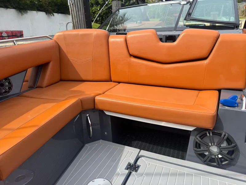 Slide: The Image of 2021 Cruisers Yachts 338 South Beach Edition Bow Rider with orange leather seating. - 33