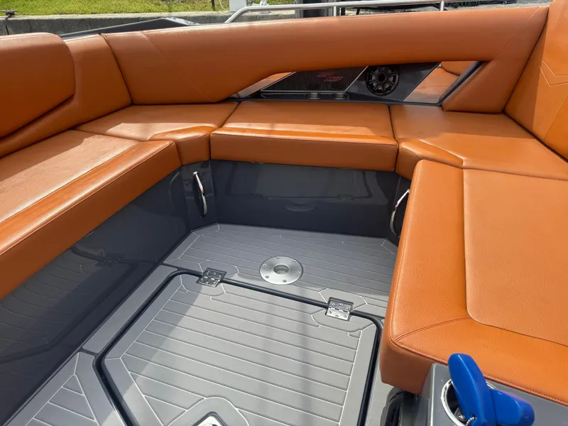 Slide: The Image of 2021 Cruisers Yachts 338 South Beach Edition Bow Rider with orange seating and sleek design. - 36
