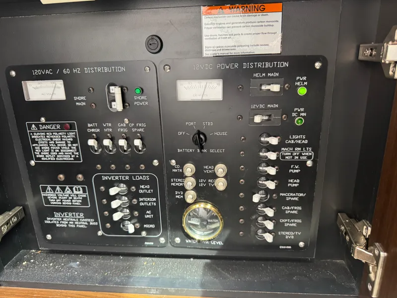 Slide: The Image of Electrical control panel of 2021 Cruisers Yachts 338 South Beach Edition Bow Rider. - 45